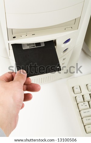 Desktop Computer and floppy Disk close up shot