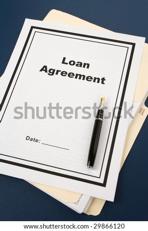 Loan Agreement and pen, business concept
