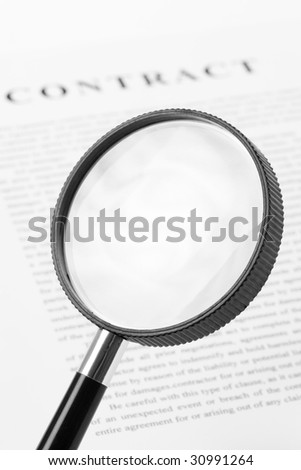 Magnifying Glass and document close up