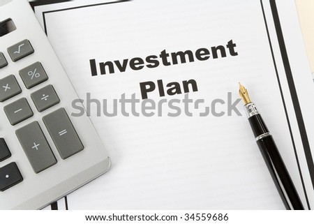 Investment Plan and pen, business concept
