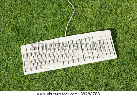 Computer Keyboard and lawn, concept of Freedom, Environment Protection