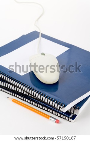 Blue school textbook and computer mouse, online learning
