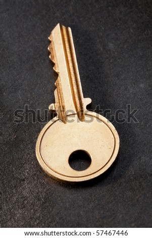 Golden House Key with black background