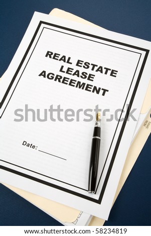 Real Estate Lease Contract and pen close up