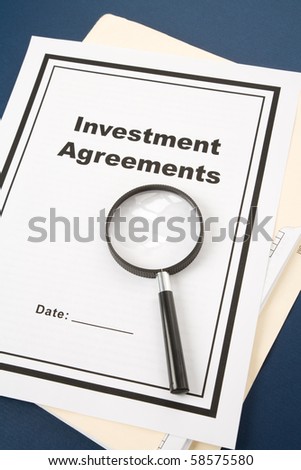Investment Agreement and Magnifying Glass, business concept