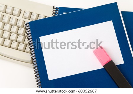 Blue school textbook and computer keyboard, online learning