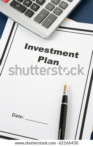 Investment Plan and pen, business concept