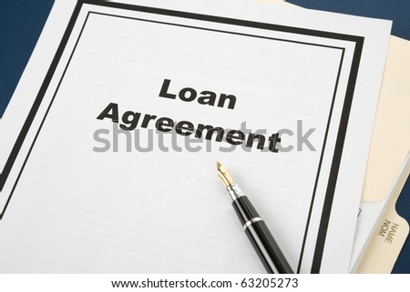 Loan Agreement and pen, business concept