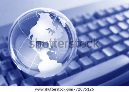 Blue Globe and Computer Keyboard for background