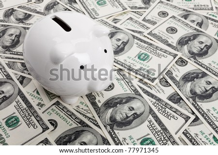 Piggy Bank and Hundred Dollar Bills for background