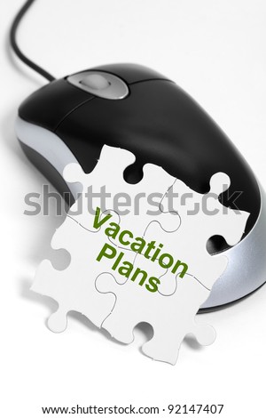 computer mouse and Puzzle, business concept of Vacation Plans