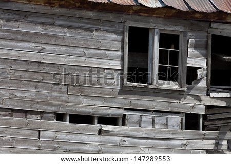 Windows on a very old wood building