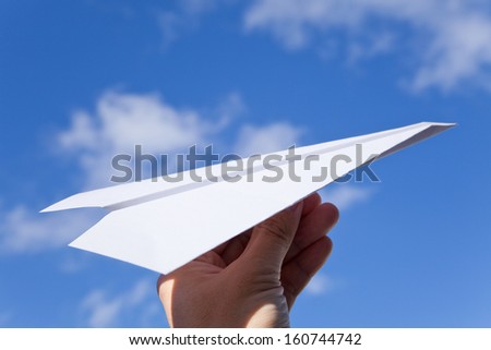 White Paper Airplane and blue sky