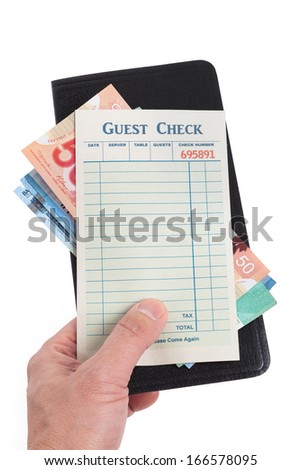 Blank Guest Check and dollar, concept of restaurant expense.