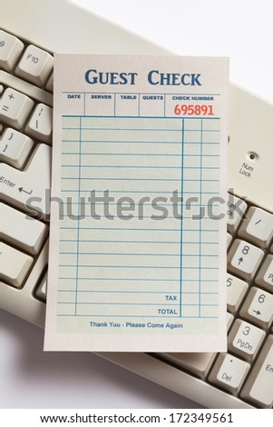 Blank Guest Check Computer keyboard, concept of online business
