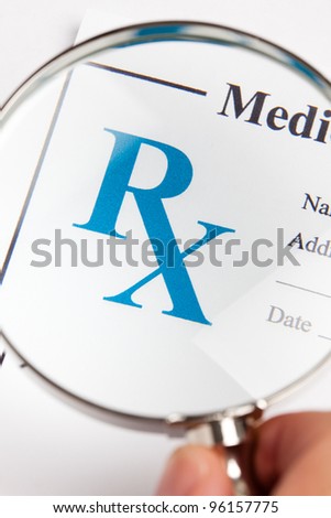 magnifying glass and Prescription, concept for Healthcare And Medicine