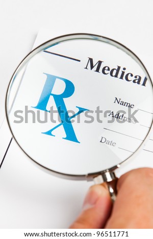magnifying glass and Prescription, concept for Healthcare And Medicine