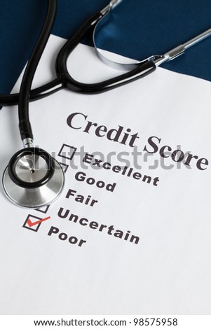 Stethoscope and Credit Report, concept of Credit Problems