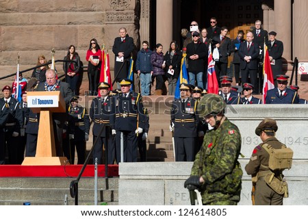 TORONTO - NOVEMBER 11: Mayor Rob Ford delivers his Remembrance Day address at Old City Hall Cenotaph in Toronto on November 11, 2012.