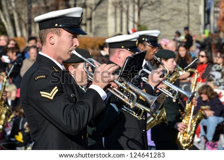 TORONTO - NOVEMBER 18: Marching band passes by at the 108th Santa Claus Parade in Toronto, Canada on November 18, 2012.
