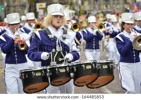 TORONTO - NOVEMBER 17: The marching band attends the 109th Toronto Santa Claus Parade in Toronto, Canada on November 17, 2013.
