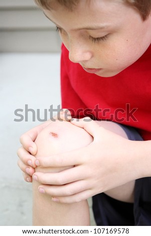 Boy with a scraped knee