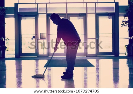 Janitor mopping the floor