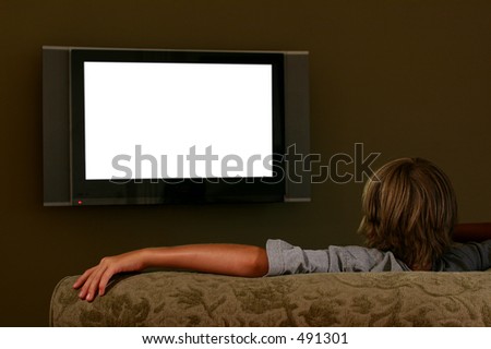 boy watching wide-screen television