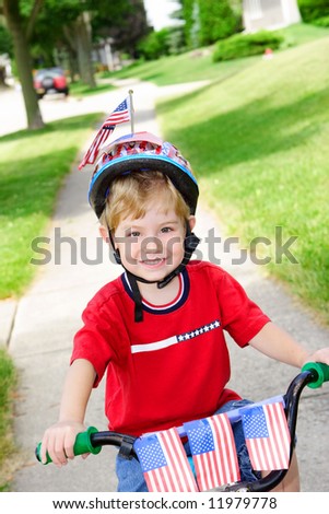 Boy on a decorated bike on the 4th of July