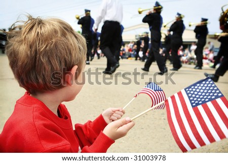 Boy watching a parade