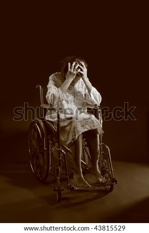 Depressed woman in a wheelchair