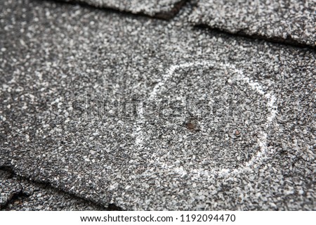 Hail damage on roof after hailstorm