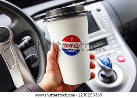 I voted today sticker on a hot drink cup free giveaway from a coffee shop