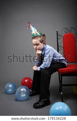 Sad boy alone on his birthday