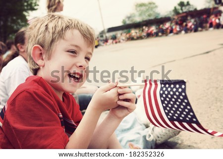 Young boy watching Holiday parade