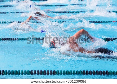 Freestyle swimmers racing