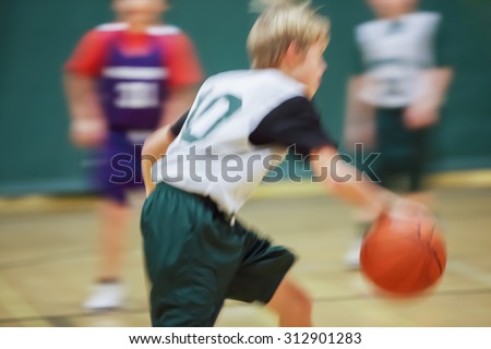 Youth basketball motion blurred image.