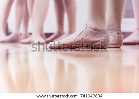 Dancers in Jazz shoes standing in the studio classroom
