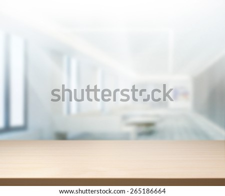 Wood Table Of Blur Background in The Office