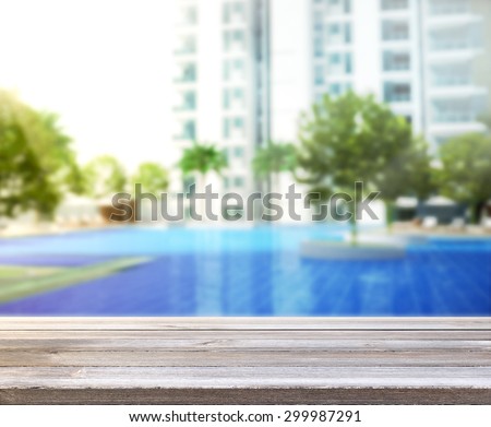 wood Table Top of Background and Pool