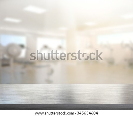 Table Top And Blur Fitness Gym of The Background