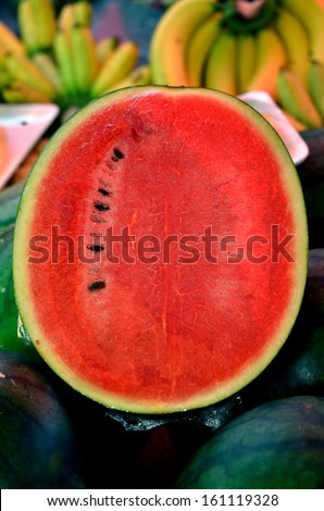 half slice watermelon and banana