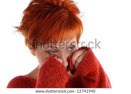 sad red haired woman isolated on white background