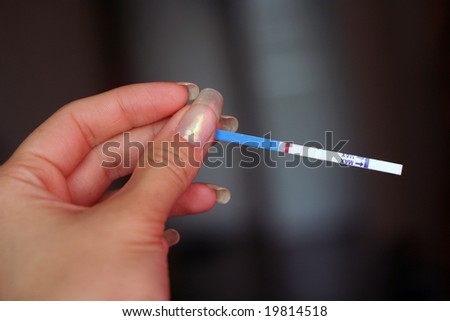 Negative baby test in female hand