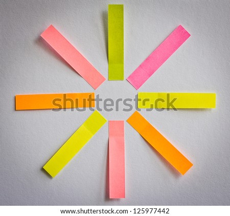 8 colored blank sticky notes in shape of sun or flower for your text - business structure, diagram, goals etc.