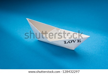 Love boat in the open sea. Abstract photo. Concept for unrequited love, loneliness, solitude.