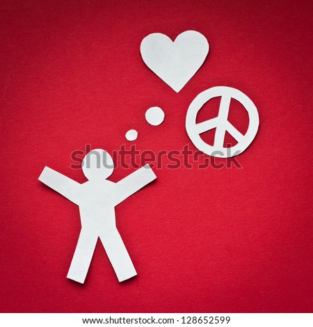 Paper person thinking about love and peace.\
Concept for pacifism, no war, peace and love on the planet.