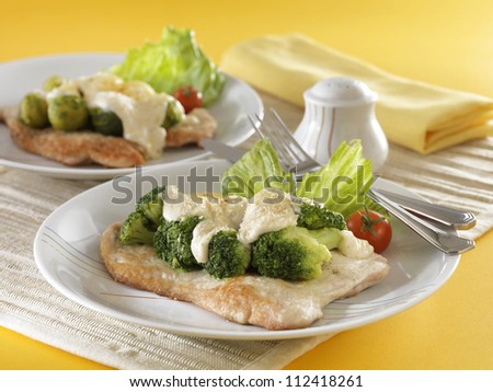 roasted turkey with broccoli on white plate