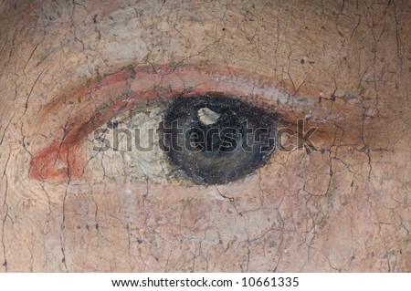 Detail of a woman\'s eye on an old baroque oil painting.