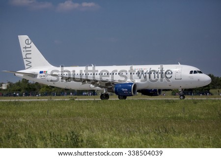 PRAGUE, CZECH REPUBLIC - JULY 1: Airbus A320 White Airways lands to PRG Airport on July 1, 2015. Portuguese airline company operating in Charter, ACMI, Wet Lease and Business Aviation markets.
